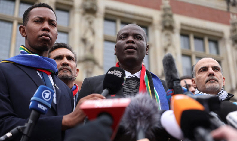 South Africaners with "Palestinians" at a news conference after charging Israel with the practice of Apartheid for their actions in the war with Hamas and activities that lead Hamas to attack Israel on October 7th 2023.  Facts show that these charges are false.